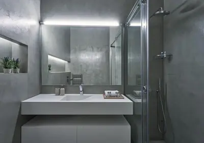 a bathroom with a white sink and a shower at Cute n Comfort Luxury Condo in Kolonaki in Athens