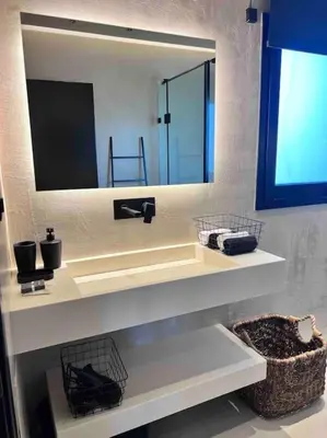a bathroom with a large mirror and a sink at Lagonisi 2 bedroom luxury Apartment by the sea! in Lagonissi