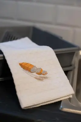 a napkin with a picture of a leaf on it at MEDLUXE COZY APARTMENT! in Athens