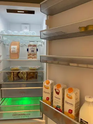 an open refrigerator with milk and eggs in it at MEDLUXE COZY APARTMENT! in Athens