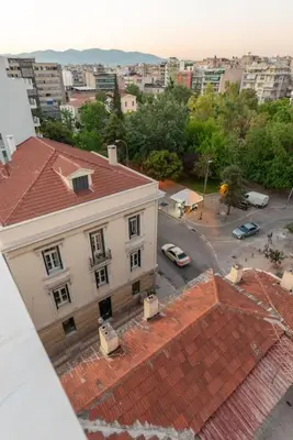an aerial view of a city with a building at Studio Acropolis Star in Athens