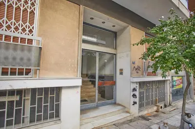 an outside view of a building with a window at Modern Hospitality- apt near Children's Hospital in Athens