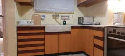 a kitchen with a sink and a microwave at Lobelia Athens Centre -5 BD, 2.5 BATH in Athens