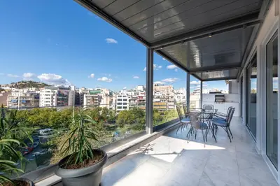 a balcony with a view of a city at Phaedrus Living City Center Luxury Flat Neos Kosmos in Athens