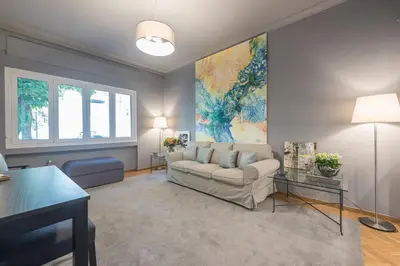 a living room with a couch and a table at Luxurious apartment in Kolonaki, Peridot -Homes in Athens
