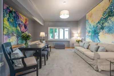a living room with a couch and a table at Luxurious apartment in Kolonaki, Peridot -Homes in Athens
