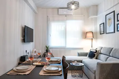 a living room with a table and a couch at apt Seventeen_2-bedroom flat_Athens citycentre in Athens