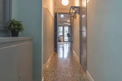 a hallway with a hallway flooring with a hallway at Friends & family 3broom apt, downtown Athens-FIX in Athens