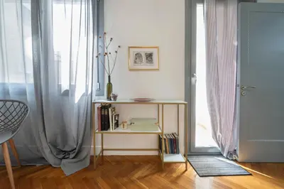 a living room with a table and a window at Friends & family 3broom apt, downtown Athens-FIX in Athens