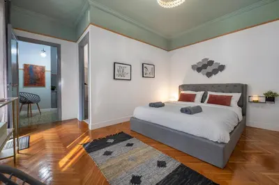 a bedroom with a large bed in a room at Friends & family 3broom apt, downtown Athens-FIX in Athens