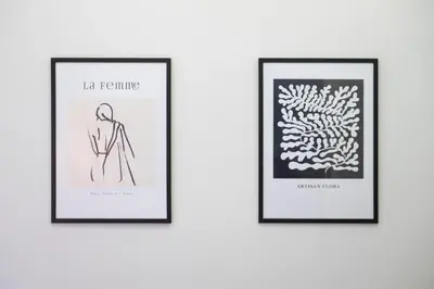 three framed prints of a woman and coral at Luxury 2 bdroom apt- Megaro Mousikis in Athens