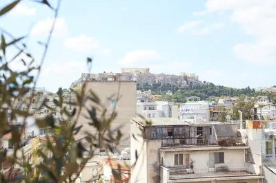 a view of the acropolis from the city of athens at Wake up with Acropolis view! in Athens