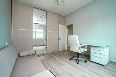 a bedroom with a bed and a desk and a chair at Charming Contemporary 2 bedroom apartment in Athens