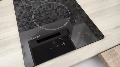 a digital clock sitting on top of a table at Kallithea Gold Apartment greendom in Athens