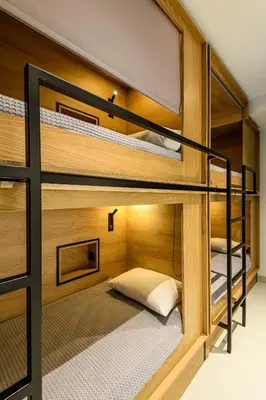 a bunk bed room with two bunk beds at Mosaikon Glostel in Athens