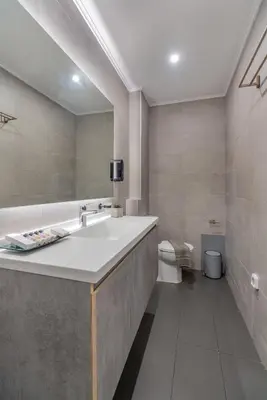 a bathroom with a sink and a toilet at Exarchia House Project in Athens