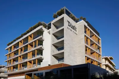 a building with plants on the top of it at Dusit Suites Hotel Athens in Athens