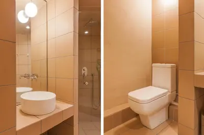two pictures of a bathroom with a toilet and a sink at Architect designed studio with green rooftop! EP7L in Athens
