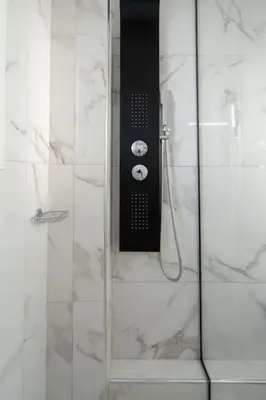 a shower with a glass door with a controls at Duplex Acropolis View 2 Balconies in Athens