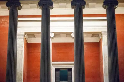 a view of the columns of a building at Center of Athens: Iris cozy apartment in Athens