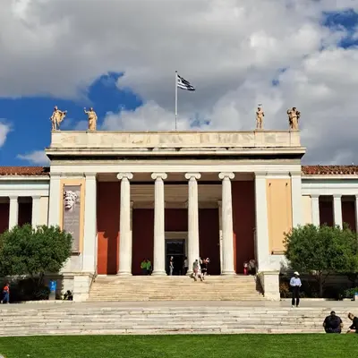 a building with a flag on top of it at Center of Athens: Iris cozy apartment in Athens