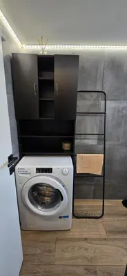 a washer and dryer in a room with at Luxury Vacation by LV in Athens