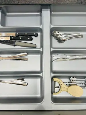 a metal container with silver utensils in it at Likourgou Suite Dialog Number 1 VIPGreece in Athens