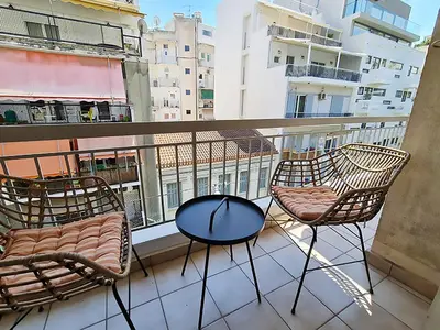 two chairs and a table on top of a balcony at Georgia on my mind in Athens