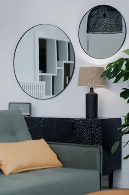 a living room with a couch and a mirror at Blue Chill Paradise Seaview Suite w/ Kingbed in Piraeus