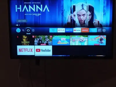 a television screen with a bunch of movies on it at Cute full apt w/backyard in Paleo Faliro in Athens