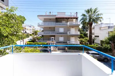 a view of a building from the balcony of a building at AIOLOS LUXURY alimos quiet SUITE 1 in Athens