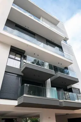 a building with balconies on the side of it at Μεζονέτα με θέα στο πάρκο Σταύρος Νιάρχος TWO in Athens