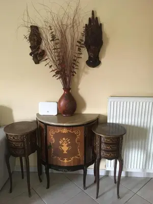 a table with two chairs and a vase on top of it at SECOND FLOOR Best stay in Athens