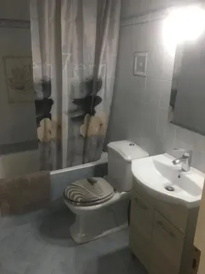 a bathroom with a toilet and a sink at SECOND FLOOR Best stay in Athens