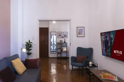 a living room with a couch and two chairs at Rare 1BR APT, next to the new Goulandris Museum in Athens