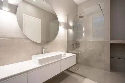 a bathroom with a sink and a mirror at Upscale Athens Luxury Penthouse in Athens