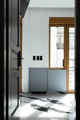 an open door in a room with a window at Athens Feeling in Athens