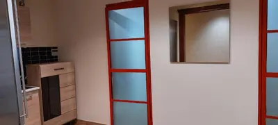 a bathroom with a mirror and a kitchen at Deluxe Apartment 12BD 6BATH in Athens