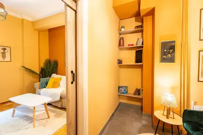 a room with a door leading to a bedroom at Renovated 2 Bedroom Apartment in City Centre in Athens