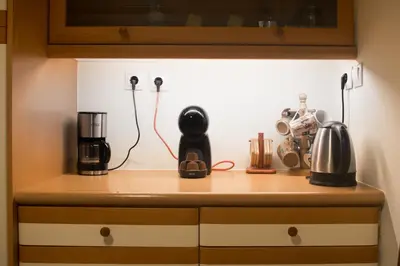 a kitchen counter with various appliances on it at Tati's Parthenon apt 2bdr with balcony in Athens