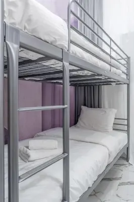 a couple of bunk beds in a room at Lux 2 bedroom apt next to metro in Athens