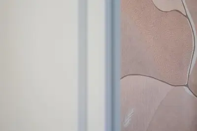 a close up of a metal door with a window at Lux 2 bedroom apt next to metro in Athens