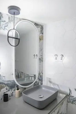 a white bathroom with a sink and a mirror at Lux 2 bedroom apt next to metro in Athens