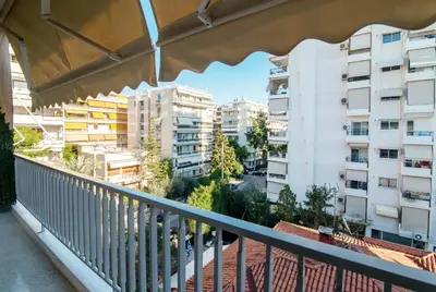 a balcony with a view of buildings at Luxury 1-Bedroom Apartment by the Sea in Athens in Athens