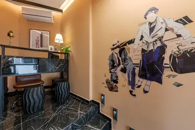 a room with a painting on the wall at Clyde Athens by Nin&Bau in Athens