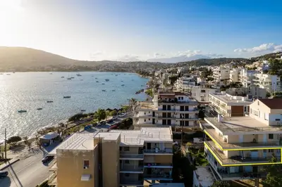 an aerial view of a city next to a body of water at Blanco Apartment by A&D Properties in Porto Rafti
