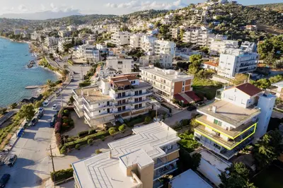 an aerial view of a city with buildings at Blanco Apartment by A&D Properties in Porto Rafti