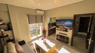 a living room with a couch and a tv at 