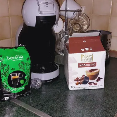 a coffee maker and a box on a counter at Elpida's house in Spáta