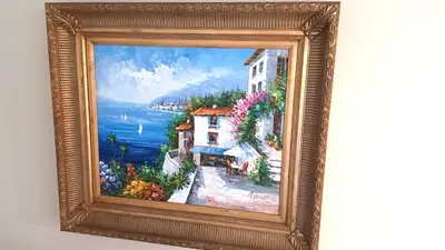 a painting of a painting of a house by the water at Apartment MARE CALMO by the sea. in Porto Rafti